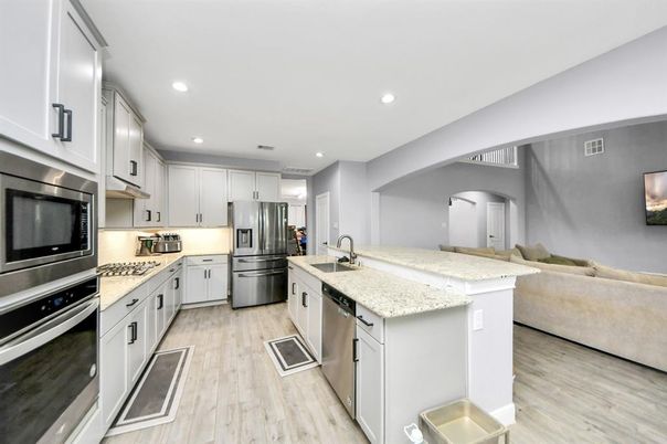 Interior, Kitchen, Recessed Lighting, Stainless Steel Appliances, Wood Texture Flooring