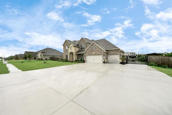 Attached, Backyard, Exterior, Facade, Brick Facade, None
