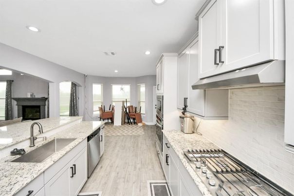 Fireplace, Interior, Kitchen, Recessed Lighting, Wood Texture Flooring