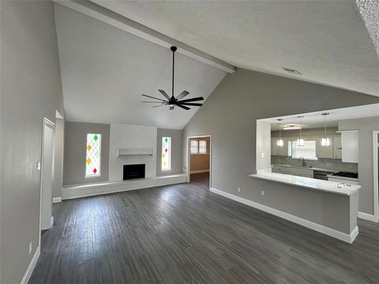 Empty room, Fireplace, Interior, Kitchen, Pendant Lights, Wood Texture Flooring