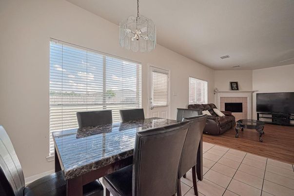 Dining room, Fireplace, Interior, Living room, Pendant Lights, Wood Texture Flooring