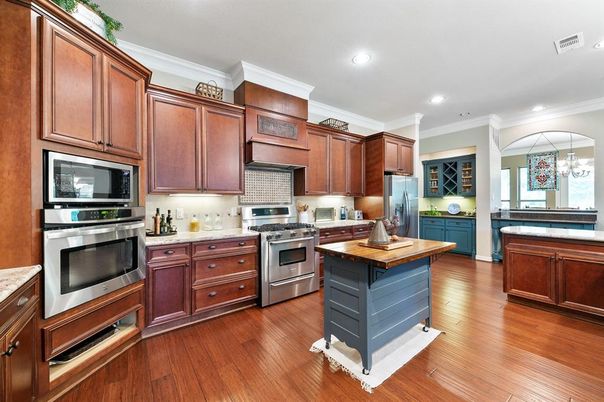 Chandelier, Interior, Kitchen, Recessed Lighting, Stainless Steel Appliances, Wood Texture Flooring