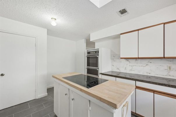 Interior, Kitchen, Marble Walls, Stainless Steel Appliances