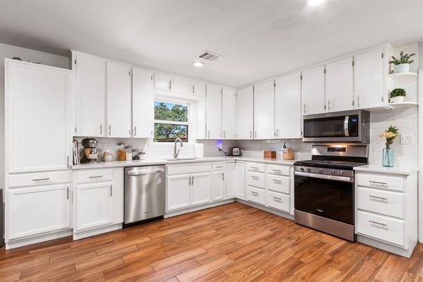 Interior, Kitchen, Recessed Lighting, Stainless Steel Appliances, Wood Texture Flooring