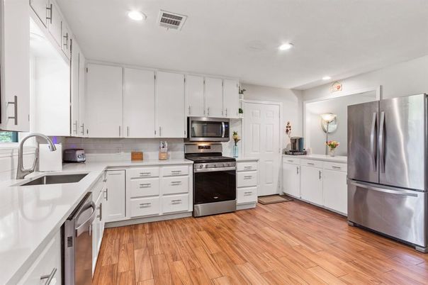 Interior, Kitchen, Recessed Lighting, Stainless Steel Appliances, Wood Texture Flooring