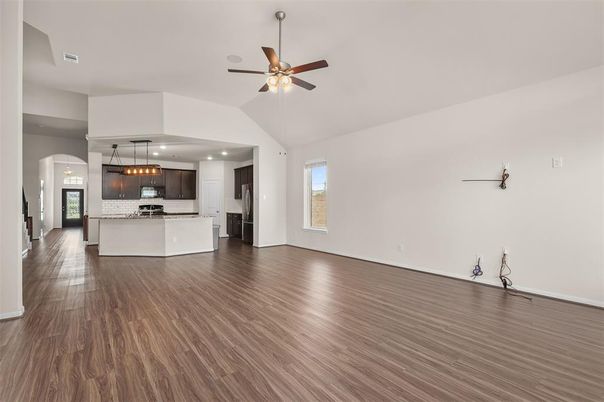 Empty room, Interior, Kitchen, Pendant Lights, Recessed Lighting, Stainless Steel Appliances, Wood Texture Flooring