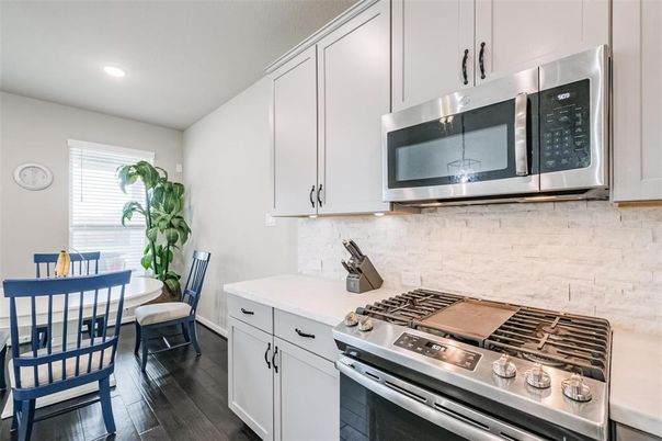 Dining room, Interior, Kitchen, Recessed Lighting, Stainless Steel Appliances, Wood Texture Flooring