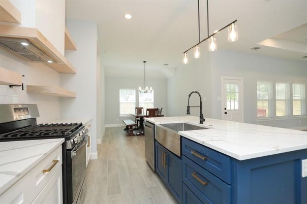 Dining room, Interior, Kitchen, Pendant Lights, Recessed Lighting, Stainless Steel Appliances, Wood Texture Flooring