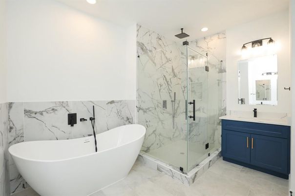 Bathroom, Free Standing Baths, Glass Shower, Interior, Marble, Marble Walls, Recessed Lighting