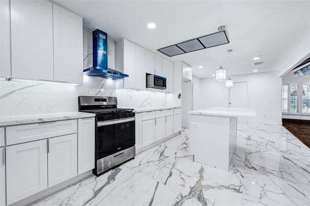 Interior, Kitchen, Marble, Marble Walls, Pendant Lights, Recessed Lighting, Stainless Steel Appliances
