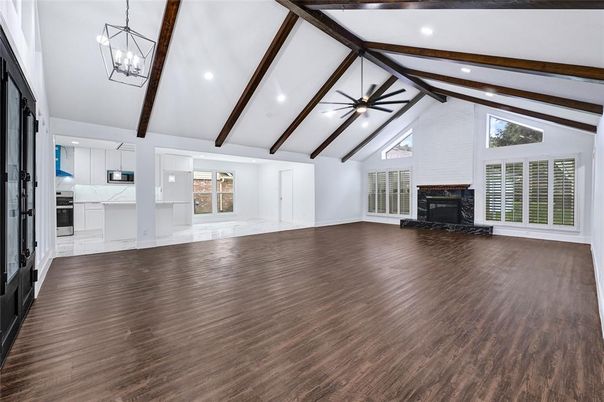 Empty room, Fireplace, Interior, Kitchen, Pendant Lights, Recessed Lighting, Wooden Beams, Wood Texture Flooring