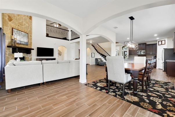 Chandelier, Dining room, Interior, Kitchen, Living room, Pendant Lights, Recessed Lighting, Wood Texture Flooring