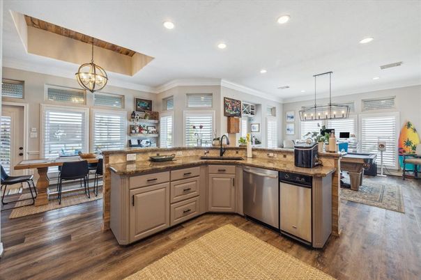 Dining room, Interior, Kitchen, Pendant Lights, Recessed Lighting, Stainless Steel Appliances, Wood Texture Flooring
