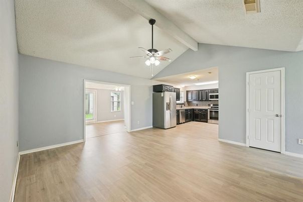 Empty room, Interior, Kitchen, Stainless Steel Appliances, Wood Texture Flooring