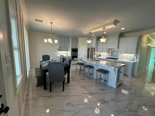 Chandelier, Dining room, Interior, Kitchen, Marble, Pendant Lights, Recessed Lighting, Stainless Steel Appliances
