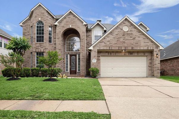 Attached, Exterior, Facade, Brick Facade, Brick Traditional