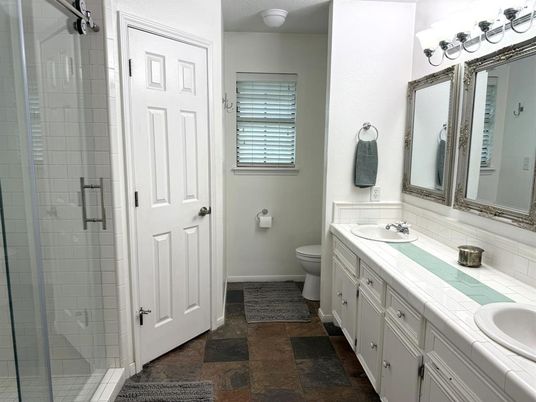 Bathroom, Dual Sink Vanities, Glass Shower, Interior, Tile Countertops