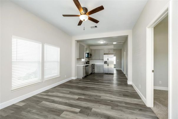 Empty room, Interior, Kitchen, Stainless Steel Appliances, Wood Texture Flooring
