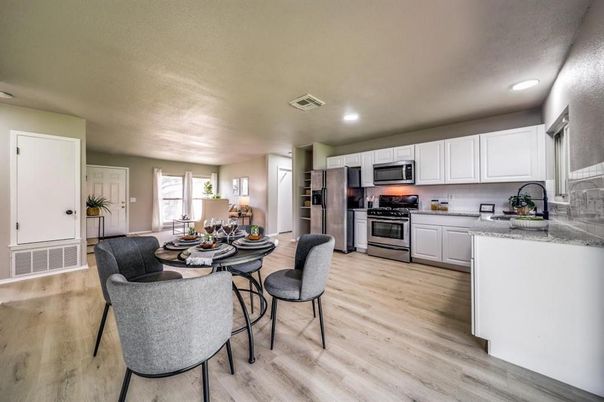 Dining room, Interior, Kitchen, Recessed Lighting, Stainless Steel Appliances, Wood Texture Flooring
