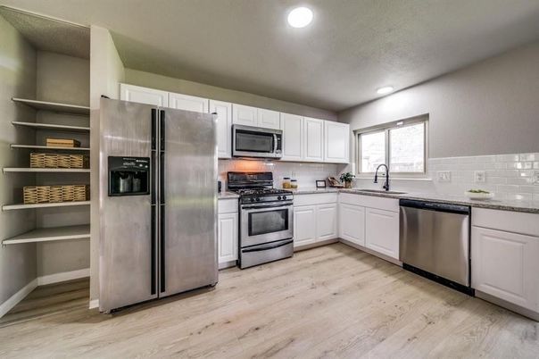 Interior, Kitchen, Recessed Lighting, Stainless Steel Appliances, Wood Texture Flooring