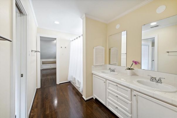 Bathroom, Dual Sink Vanities, Interior, Recessed Lighting, Tile Countertops, Wood Texture Flooring