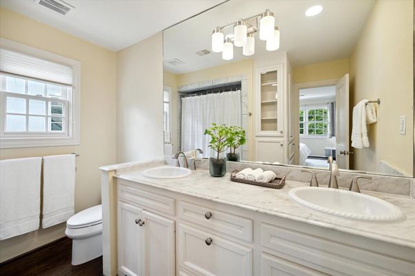Bathroom, Dual Sink Vanities, Interior, Recessed Lighting, Wood Texture Flooring