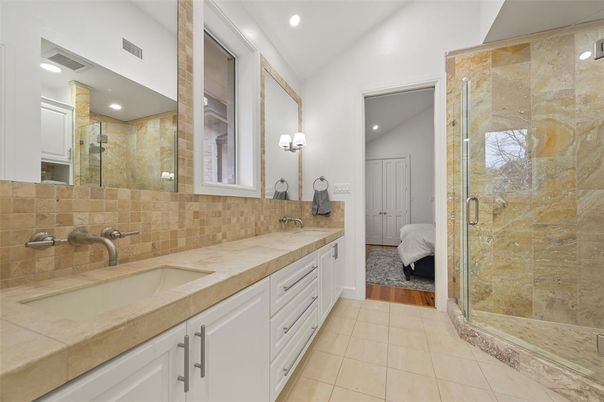Bathroom, Bedroom, Dual Sink Vanities, Glass Shower, Interior, Recessed Lighting, Wood Texture Flooring