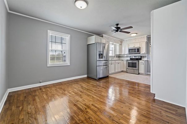 Empty room, Interior, Kitchen, Stainless Steel Appliances, Wood Texture Flooring