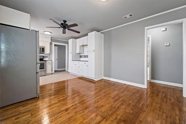 Empty room, Interior, Kitchen, Stainless Steel Appliances, Wood Texture Flooring
