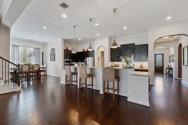 Dining room, Interior, Kitchen, Pendant Lights, Recessed Lighting, Stainless Steel Appliances, Wood Texture Flooring