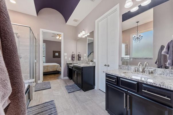 Bathroom, Bedroom, Chandelier, Dual Sink Vanities, Glass Shower, Interior, Recessed Lighting