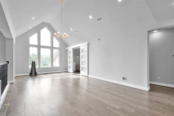 Empty room, Fireplace, Interior, Pendant Lights, Recessed Lighting, Wood Texture Flooring