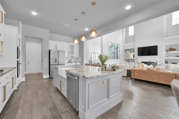 Fireplace, Interior, Kitchen, Living room, Pendant Lights, Recessed Lighting, Stainless Steel Appliances, Wood Texture Flooring
