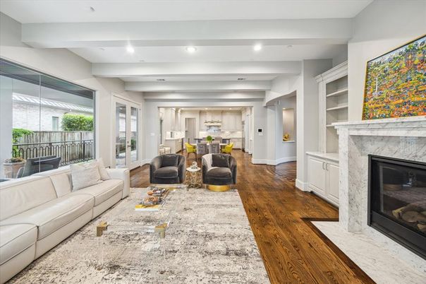 Dining room, Fireplace, Interior, Living room, Recessed Lighting, Wood Texture Flooring