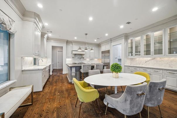 Dining room, Interior, Kitchen, Pendant Lights, Recessed Lighting, Stainless Steel Appliances, Wood Texture Flooring