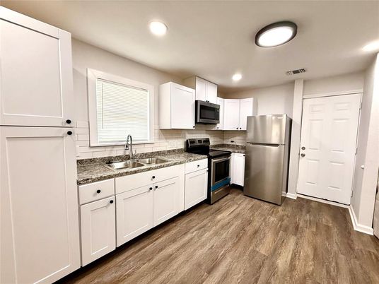 Interior, Kitchen, Recessed Lighting, Stainless Steel Appliances, Wood Texture Flooring