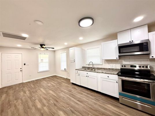 Interior, Kitchen, Recessed Lighting, Stainless Steel Appliances, Wood Texture Flooring