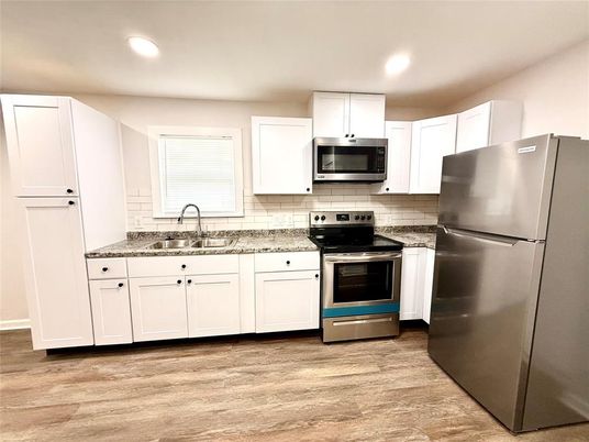 Interior, Kitchen, Recessed Lighting, Stainless Steel Appliances, Wood Texture Flooring