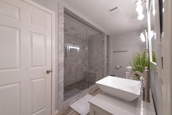 Bathroom, Glass Shower, Interior, Marble Walls, Wood Texture Flooring