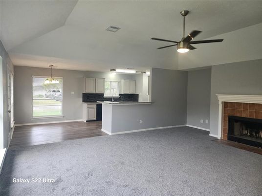 Empty room, Fireplace, Interior, Kitchen, Pendant Lights, Wood Texture Flooring