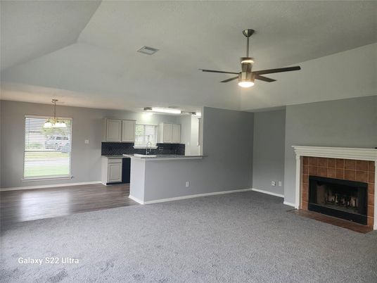 Empty room, Fireplace, Interior, Kitchen, Pendant Lights, Wood Texture Flooring
