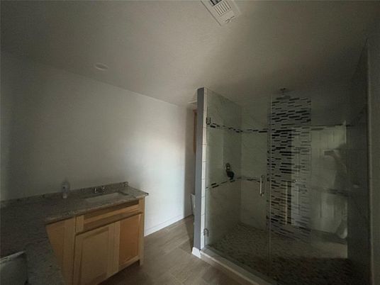 Bathroom, Glass Shower, Interior, Recessed Lighting, Wood Texture Flooring