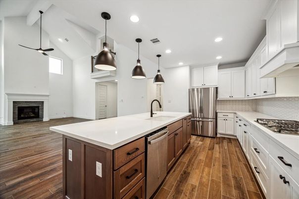 Fireplace, Interior, Kitchen, Pendant Lights, Recessed Lighting, Stainless Steel Appliances, Wood Texture Flooring