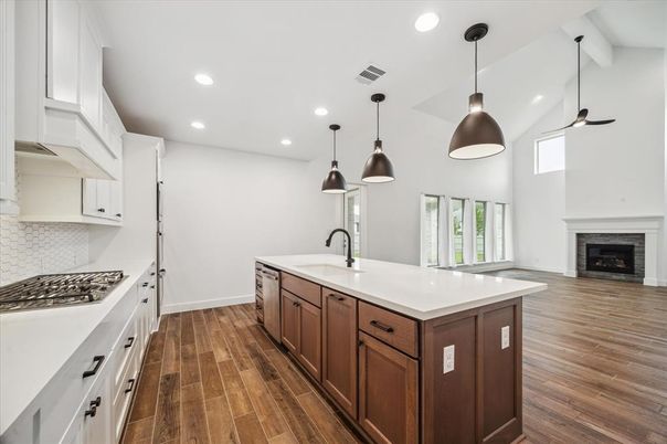 Fireplace, Interior, Kitchen, Pendant Lights, Recessed Lighting, Stainless Steel Appliances, Wood Texture Flooring
