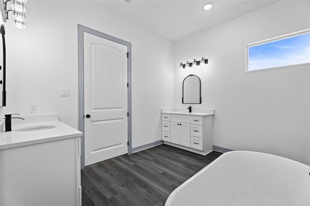 Bathroom, Dual Sink Vanities, Free Standing Baths, Interior, Recessed Lighting, Wood Texture Flooring