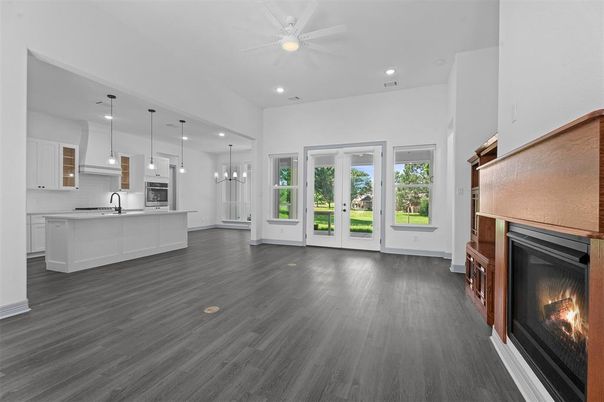Empty room, Fireplace, Interior, Kitchen, Pendant Lights, Recessed Lighting, Wood Texture Flooring