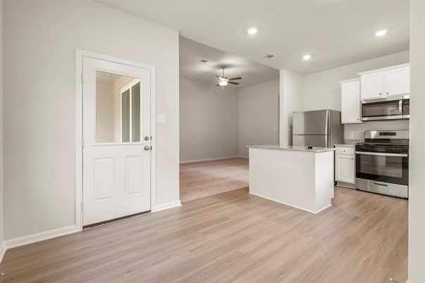 Interior, Kitchen, Recessed Lighting, Stainless Steel Appliances, Wood Texture Flooring