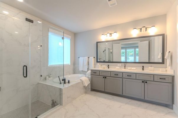 Bathroom, Dual Sink Vanities, Glass Shower, Interior, Marble, Marble Walls, Recessed Lighting