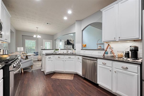 Dining room, Interior, Kitchen, Living room, Pendant Lights, Recessed Lighting, Stainless Steel Appliances, Wood Texture Flooring
