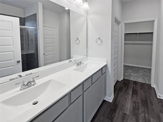 Bathroom, Dual Sink Vanities, Glass Shower, Interior, Walk-in Closets, Wood Texture Flooring